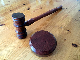 Wooden Judge Gavel and Sound Block on Table