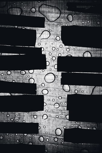 Abstract black and white water droplets on textured background
