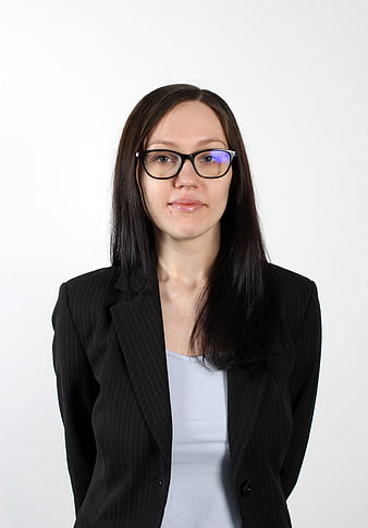 Professional Portrait of Business Woman Wearing Glasses and Black Blazer