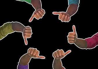 Group of hands giving thumbs up and down on black background