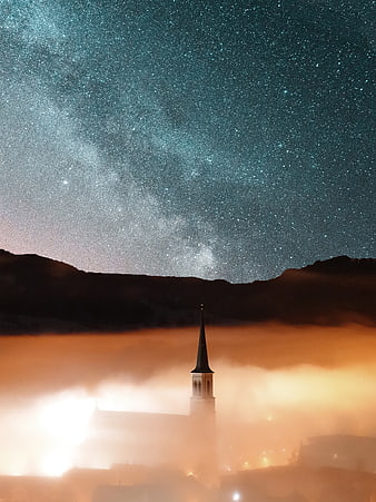 Church Tower Silhouette in Fog Under Milky Way Night Sky