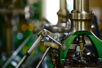 Close-up of industrial machinery gears and metal components