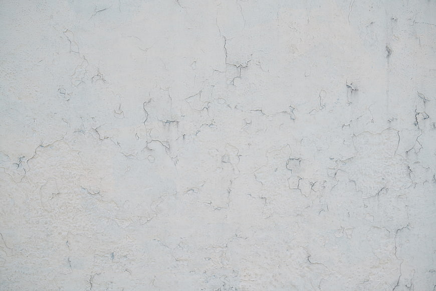 White Cracked Plaster Wall Texture Background