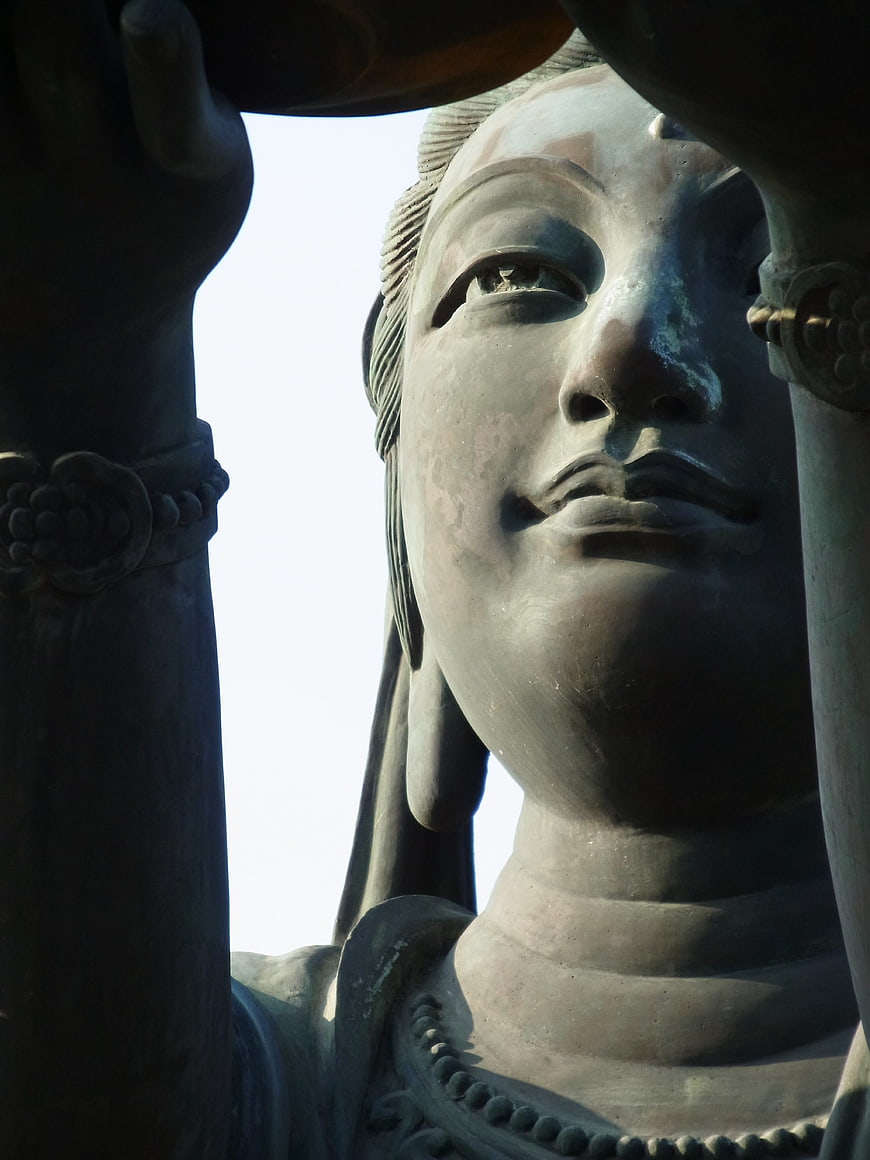 Close-up of Guanyin Statue Face in Hong Kong Temple