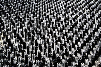 Massive Array of Empty Glass Bottles in Industrial Rows