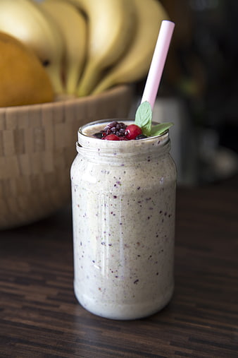 Healthy Berry Smoothie in Mason Jar with Straw