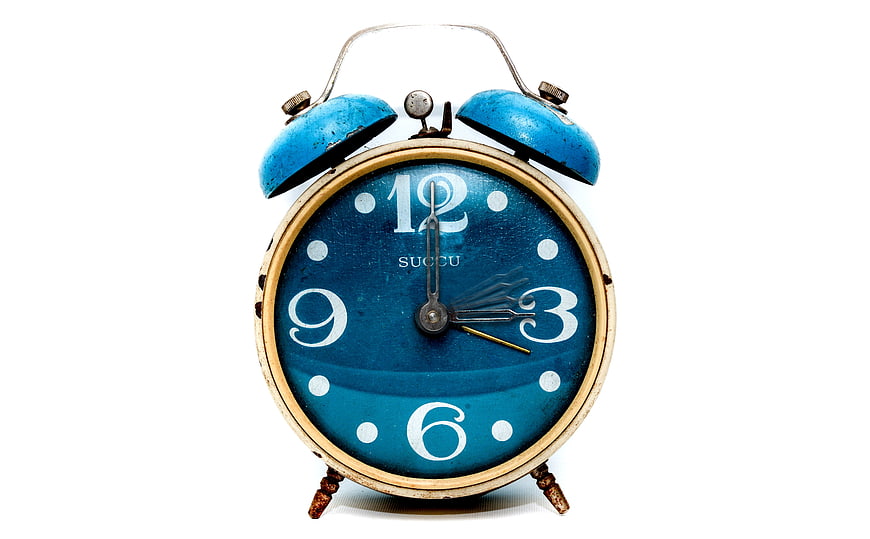 Vintage Blue Alarm Clock on White Background