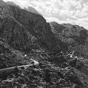 Black and white winding mountain road landscape