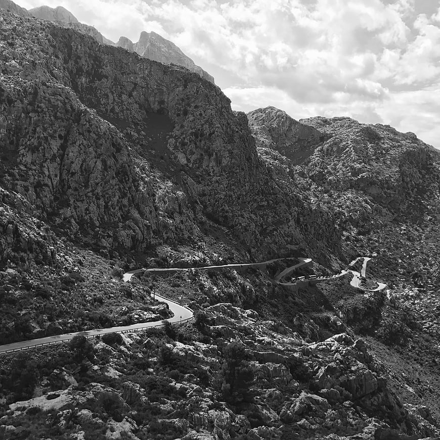Black and white winding mountain road landscape