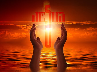Praying Hands Holding Glowing Cross Against Orange Sunset Sky