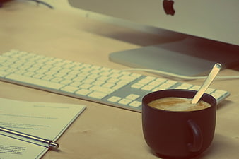 Coffee Mug on Desk with Keyboard and Computer