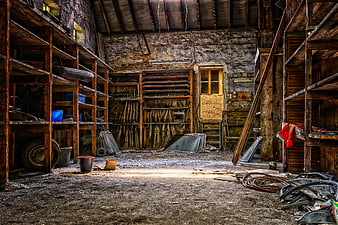 Interior of an Abandoned Workshop with Rusty Shelves and Debris