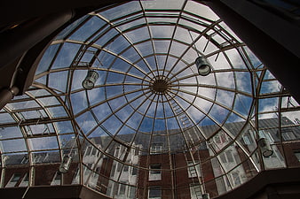 Low angle view of modern glass dome ceiling architecture