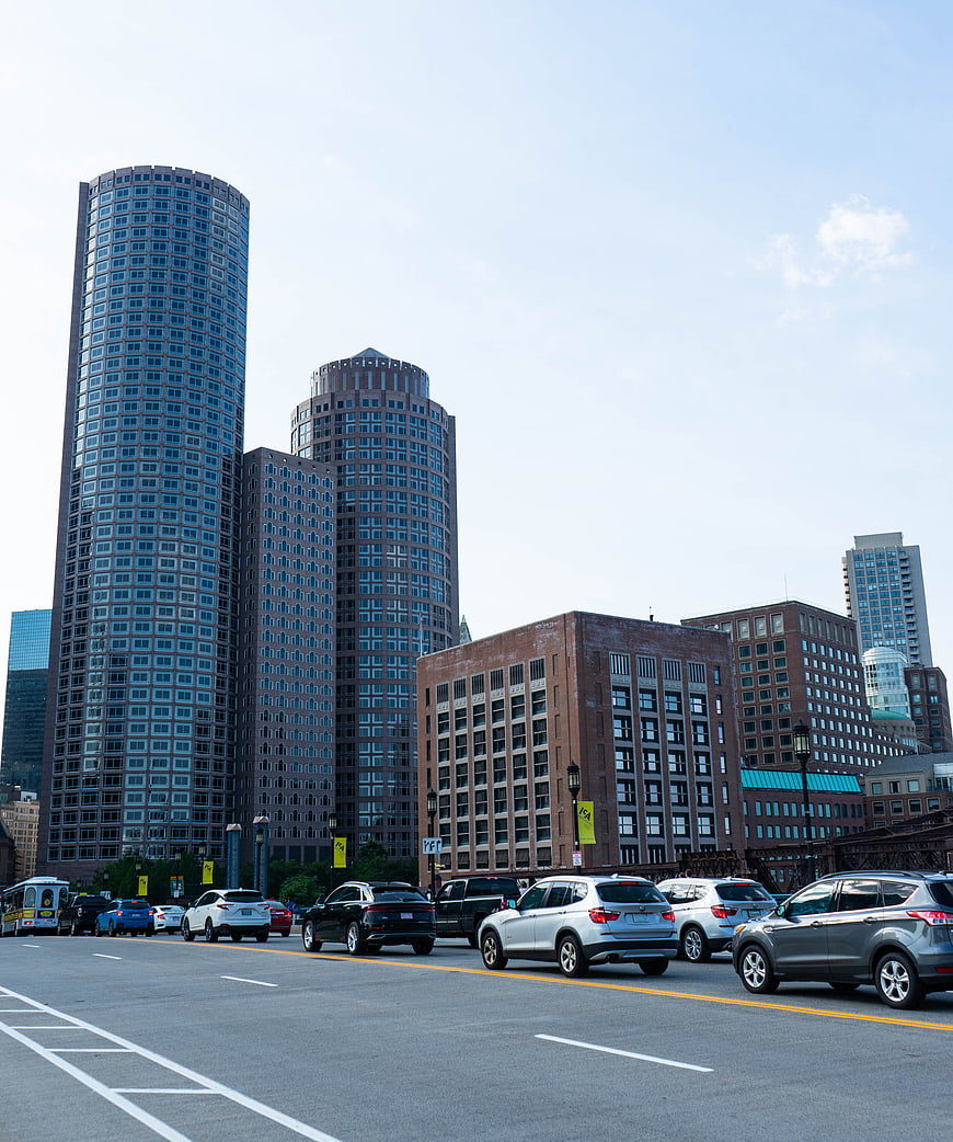 City Street Traffic with Skyscrapers and Cars