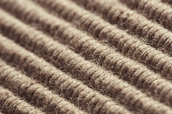 Close-up of brown ribbed wool fabric texture