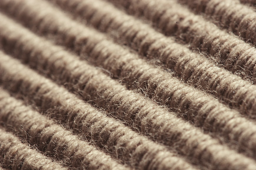 Close-up of brown ribbed wool fabric texture
