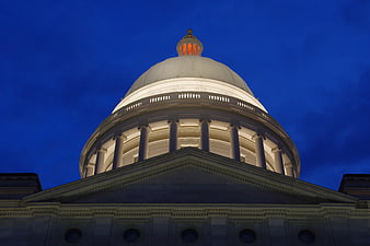 Illuminated Capitol Dome Against Deep Blue Night Sky