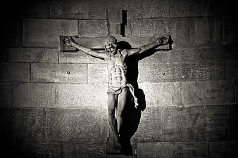 Dramatic Black and White Statue of Jesus on the Cross