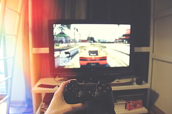 First Person View Playing Racing Game on TV with Controller