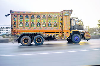 Colorful Pakistani Truck Art in Motion on Highway