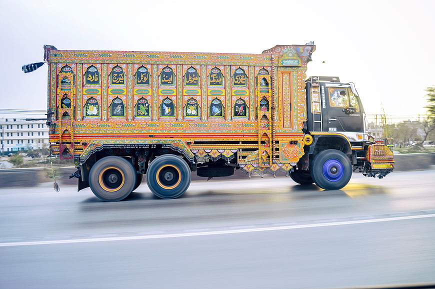 Colorful Pakistani Truck Art in Motion on Highway