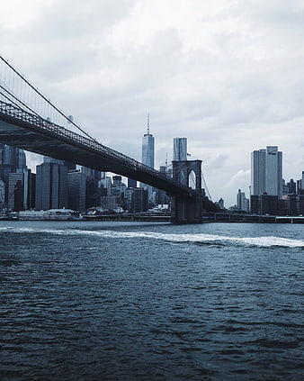 Brooklyn Bridge and Manhattan Skyline Over East River