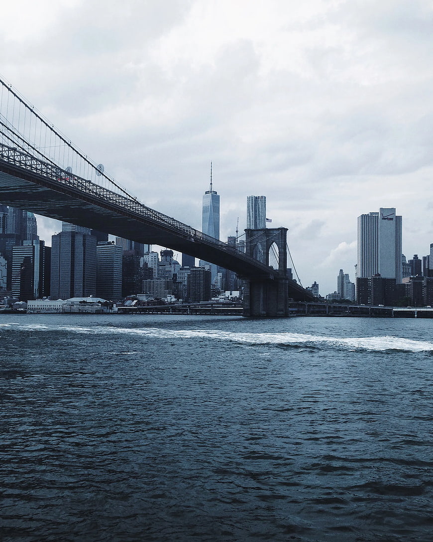 Brooklyn Bridge and Manhattan Skyline Over East River