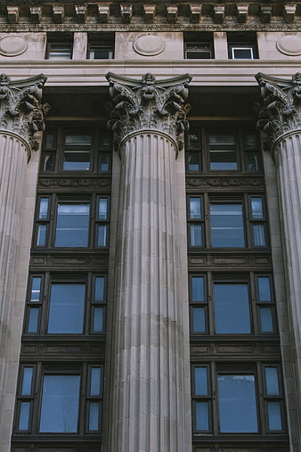 Classic Architecture with Ornate Corinthian Columns and Windows