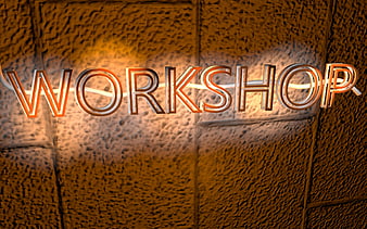 Glowing Workshop Sign on Textured Wall
