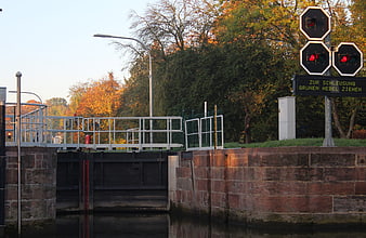 Canal Lock with Traffic Lights and Autumn Trees