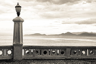 Vintage Sepia Coastal View with Ornate Balustrade