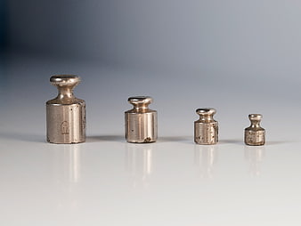 Vintage Soviet Calibration Weights Arranged in Descending Size