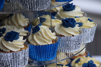 Blue and White Frosted Cupcakes on a Tiered Stand