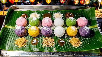 Colorful Thai Sticky Rice Dessert on Banana Leaf