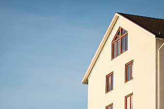 Modern House Exterior with Blue Sky Background