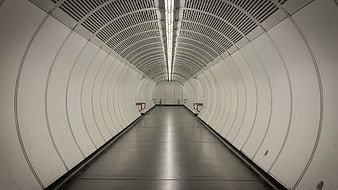 Empty White Subway Tunnel Corridor With Symmetrical Perspective