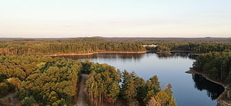 Aerial View of Serene Lake Surrounded by Autumn Forest