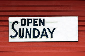 Open Sunday Sign On Red Wooden Wall