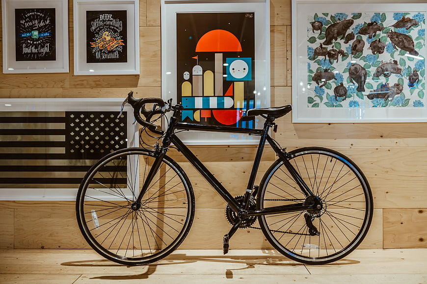 Black Road Bicycle in Modern Art Gallery