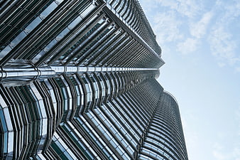 Low angle view of modern glass skyscraper architecture