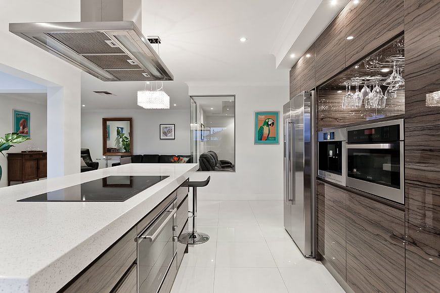 Modern kitchen interior with island and stainless steel appliances