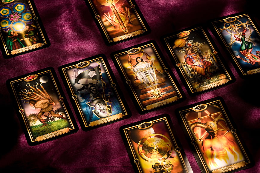 Mystical Tarot Card Spread on Purple Velvet Background