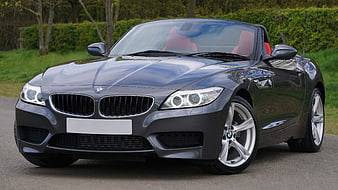 Gray BMW Z4 Roadster Parked On Paved Driveway