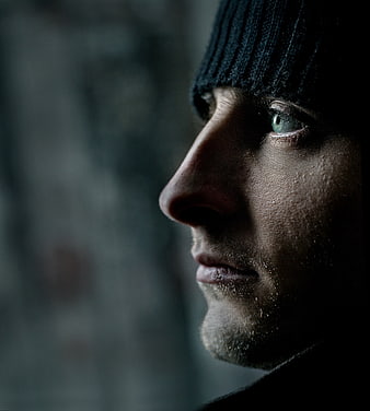 Moody Close-Up Portrait of Man in Beanie