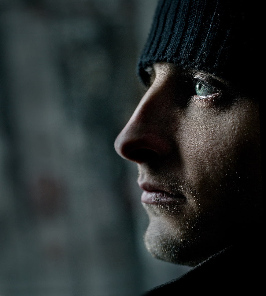 Moody Close-Up Portrait of Man in Beanie