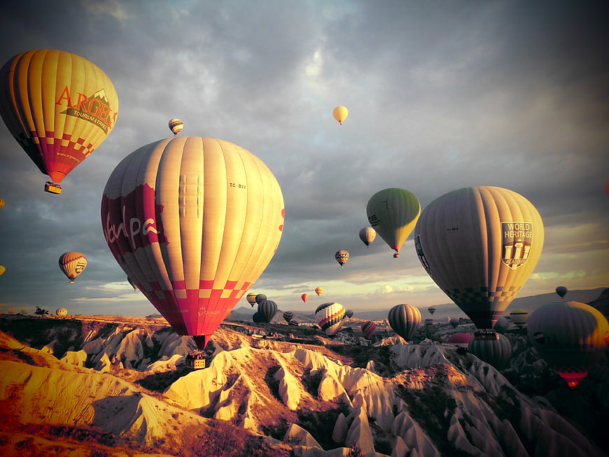 Hot Air Balloons Flying Over Cappadocia at Sunrise