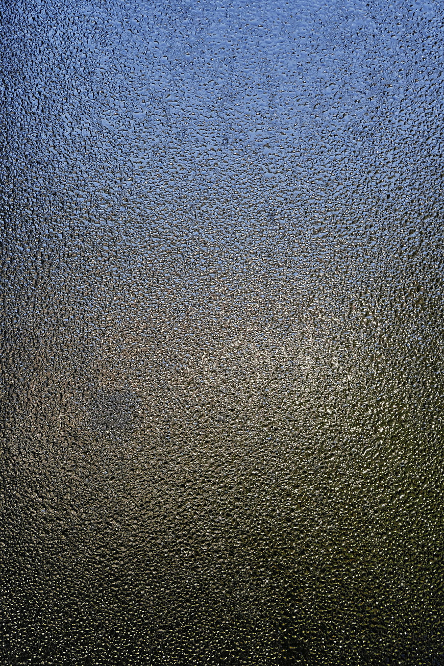 Condensation Droplets on Frosted Glass Background