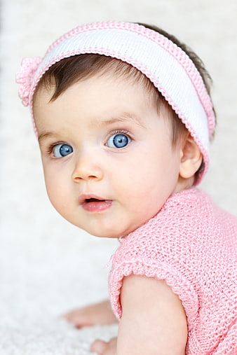 Cute Baby Girl Portrait Wearing Pink Knit Headband and Top