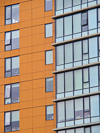 Modern Orange and Glass Building Facade Architecture