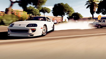 White Sports Car Drifting on Street